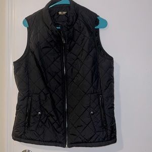 Women’s black vest with zippered pockets